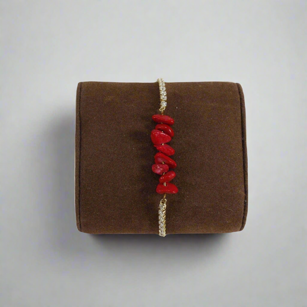 Bolo bracelet with faux coral beads for women.