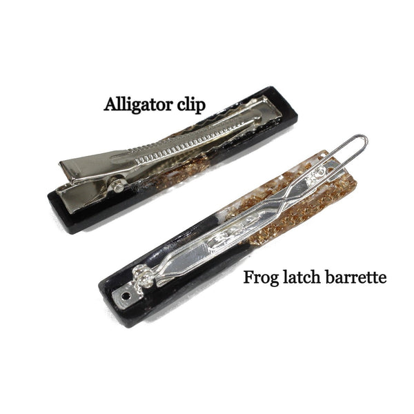 two differnet tipes of hair clips- alliator clip and frog latch barrette