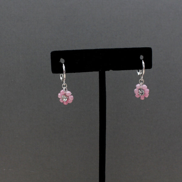 Sterling silver huggie earrings with pink daisy flower and rhinestone