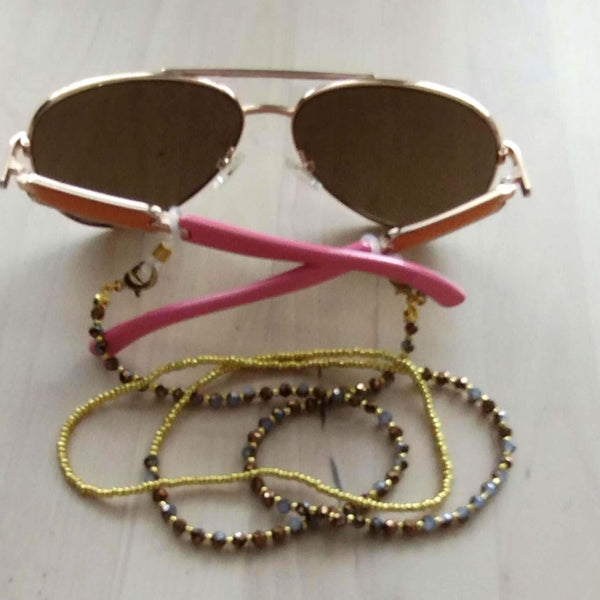 Handmade beaded eyeglass chain with sparkling glass beads, featuring stylish sunglasses, perfect eyewear holder.