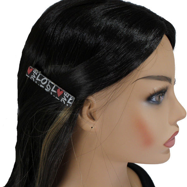 alligator hair clip in rectangle shape with words love on it