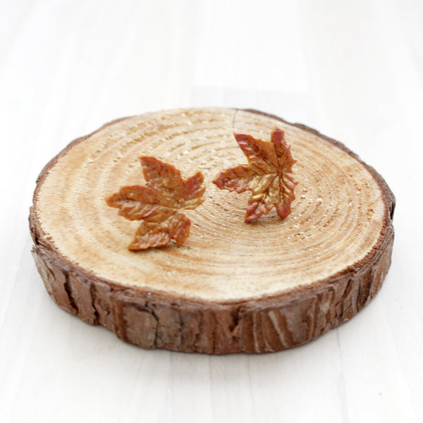 Gold-brown maple leaf stud earrings