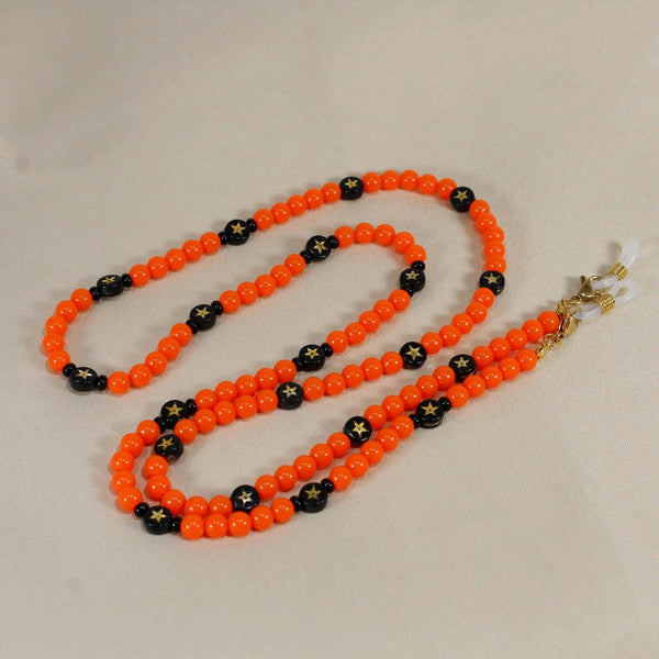 Halloween beaded eyeglass chain with orange and black beads
