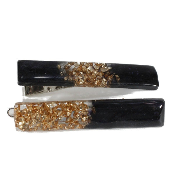 Beautiful handmade black with gold glass inclusions resin hair clip.