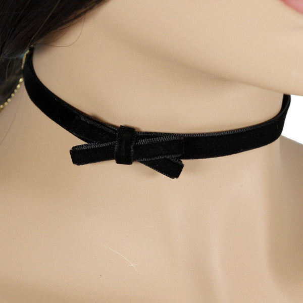 Black velvet choker necklace with a bow
