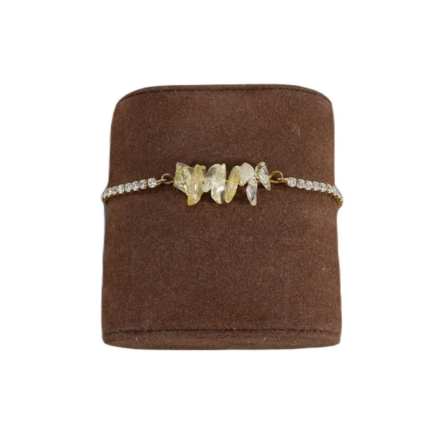 delicate gold bolo bracelet with faux light yellow gemstone