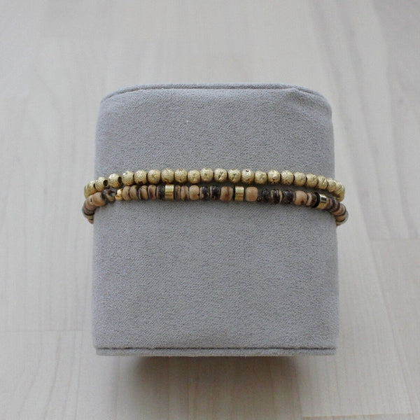 Set of two barcelets on jewelry pillow