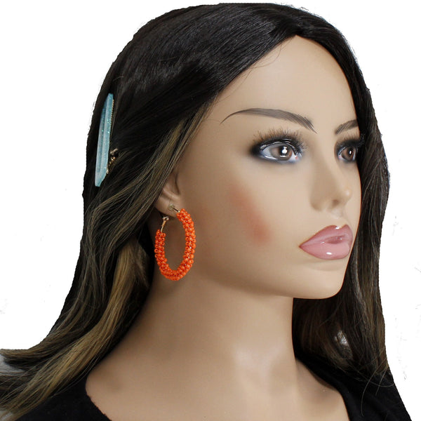 Cute and spooky Halloween inspired beaded hoops earrings with a spider charm