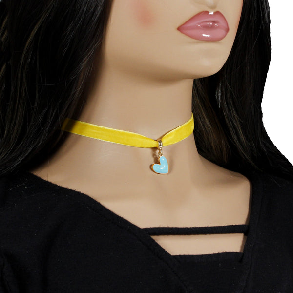 Bold yellow velvet choker with heart pendant charm for woman