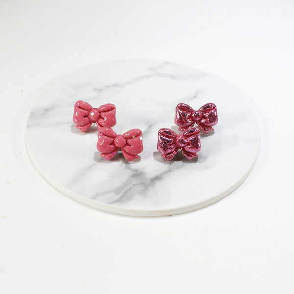 Charming pink bow stud earrings