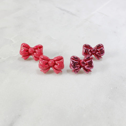 Charming pink bow stud earrings