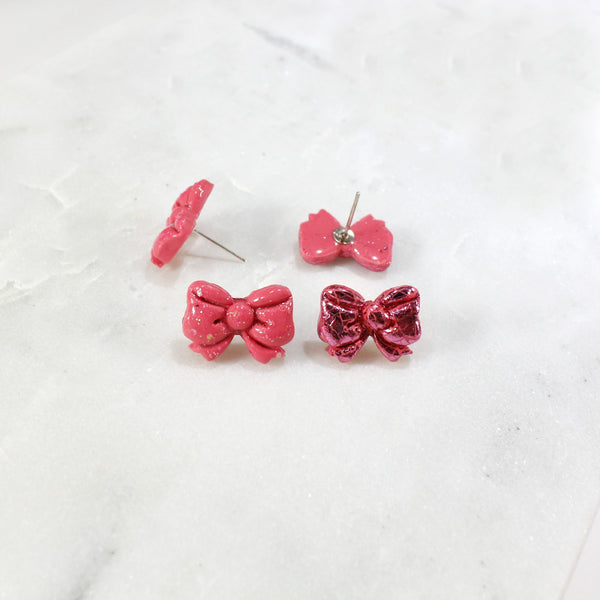 Charming pink bow stud earrings