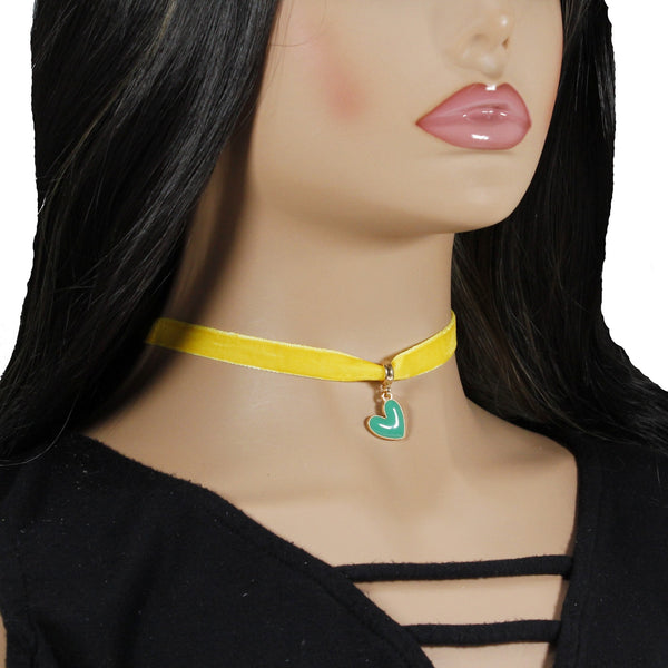 Bold yellow velvet choker with heart pendant charm for woman