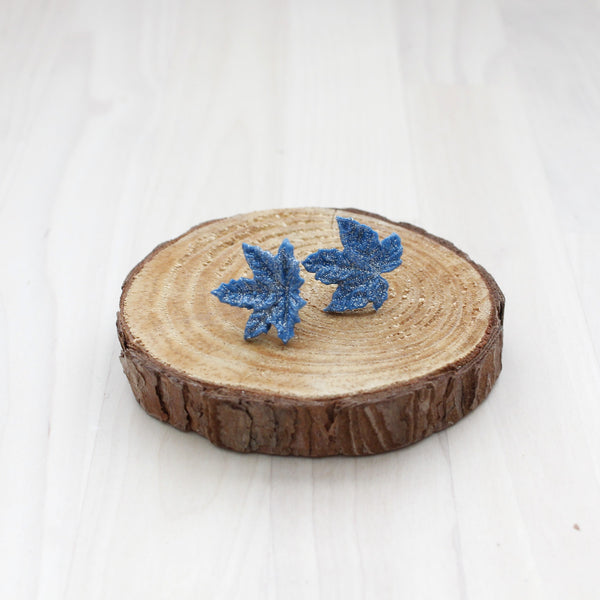 Silver-blue maple leaf stud earrings