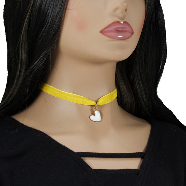 Bold yellow velvet choker with heart pendant charm for woman