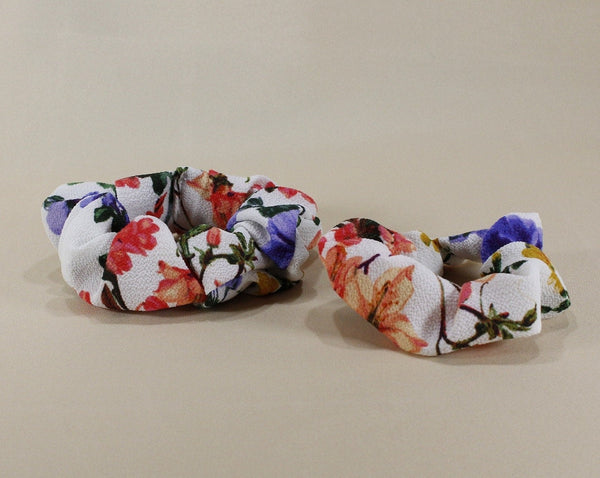 Matching set scrunchies for mom and girl with floral pattern