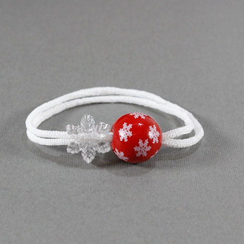 Set of two red with crystal-clear snowflakes embellishments hair ties