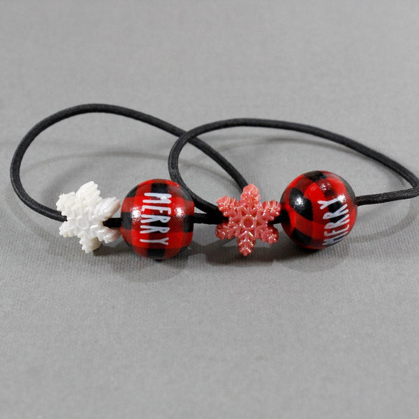 Set of two red plaid and snowflake embellishment hair tie for women and girls